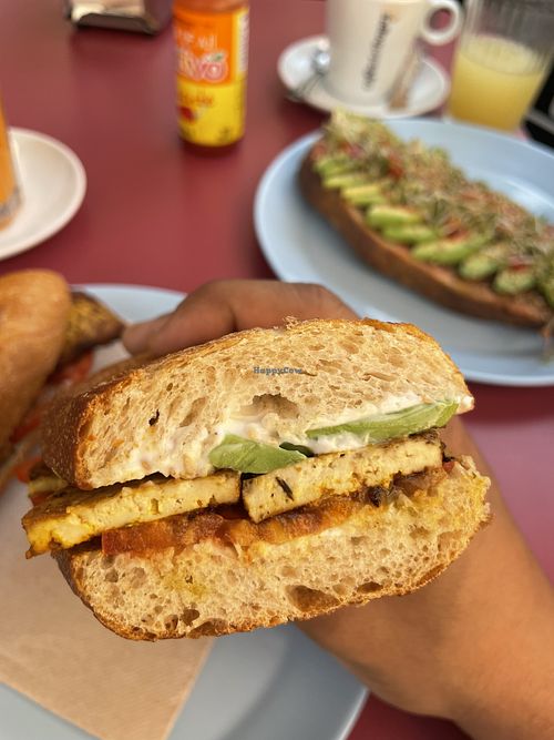 Tofu avocado vegan mayo sandwich. On the background, avocado tomato toast😄 at Arte-sans in Castelldefels