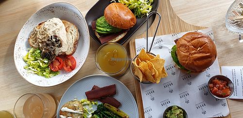 Full Medames, Beyond burger with caramelised onion, "fish"-cake, "bacon" bap at The Brook in Wallington