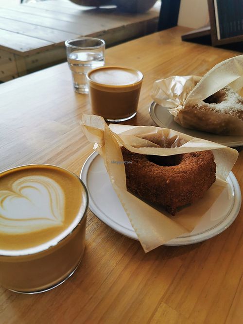 vegan donuts with flat white at The Pow Bar Cafe in Niseko