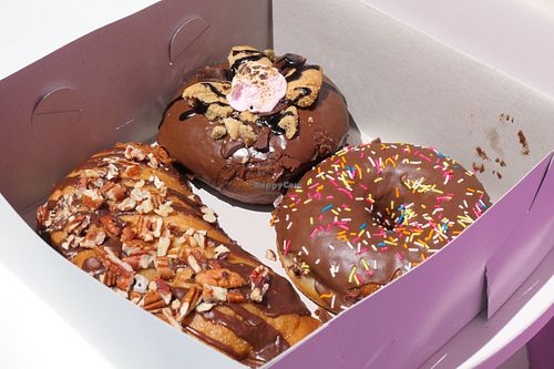 S’more’s donut, chocolate sprinkle donut and pecan brownie and cream fold over   at Grumpy & Runt in Western Cape