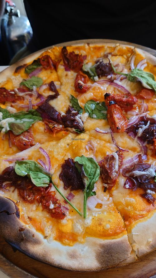 Pizza with very thin and crunchy dough at The Chubby Cherub in Belfast