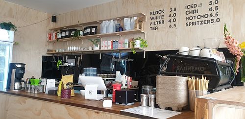 Counter area and beverage prices at Staple in Altona