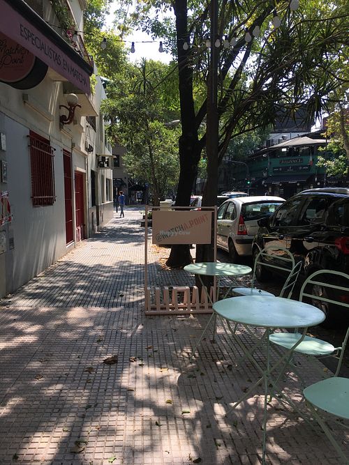 Tables at El Salvador sidewalk at Matcha Point in Buenos Aires