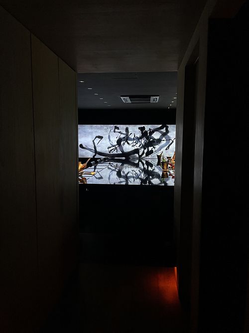 Inside the restaurant. The big table is shared by all guests  at Vegan Ramen UZU Kyoto in Kyoto