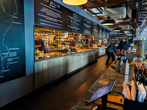 The kitchen, and part of the inside of the very large dining area at Fotografiska -- all with really nice design at Fotografiska in Stockholm
