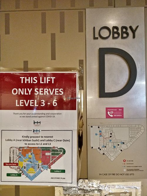 At level 2 of lobby D, exit into the car park and turn right at Veggie Delight at Neo-Percept in West Singapore