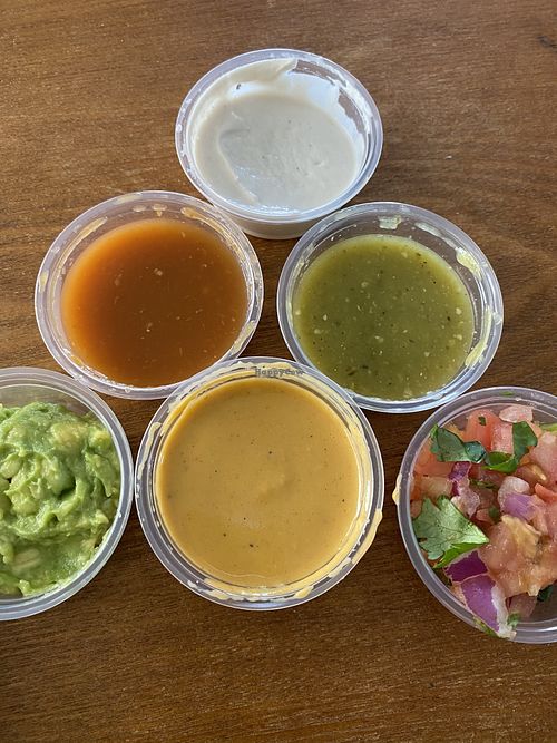 Sauces  the red one is no joke.  at Chicana Vegana in Fullerton
