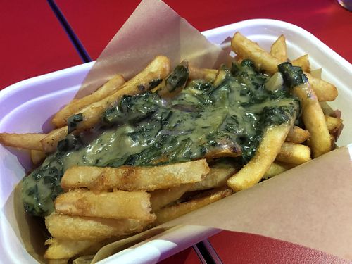 Loaded fries with spinach creme vegan at Love Handle in Central Singapore