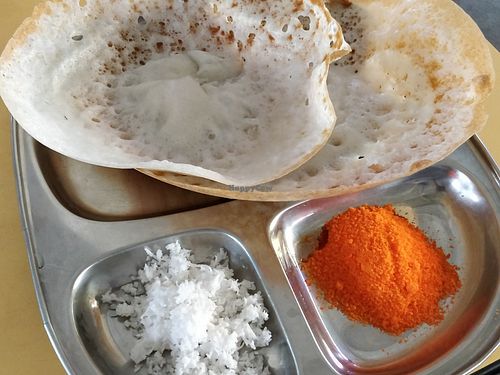Plain appam with grated coconut and brown sugar at Heavens in Central Singapore