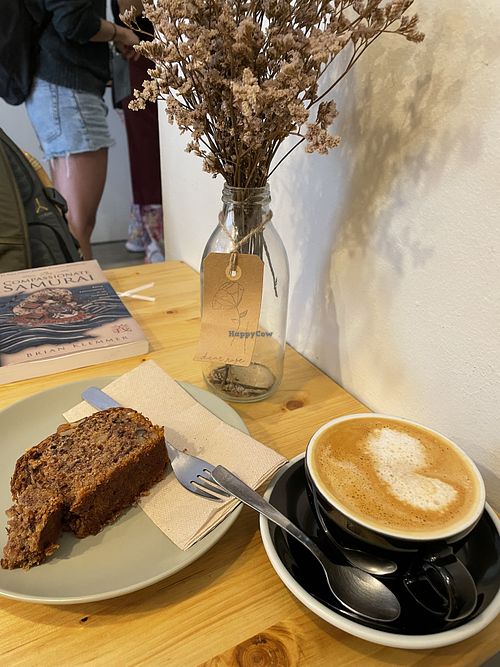 Banana bread and cappuccino   at Dear Rose Cafe in Ericeira