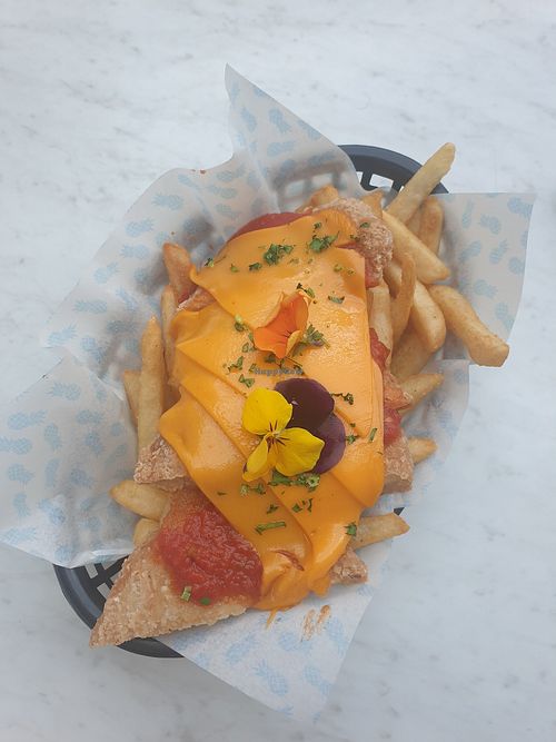 Plant based Chicken Parmigiana with vegan Chees at Jamaica Blue in Brookvale