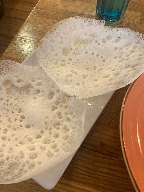 Appam - I’d never had anything like these before but they were great! I love the texture! at Kayal in Nottingham