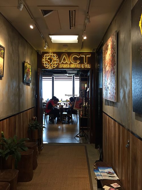 In an office building up to the 15/F and here is the entrance  at Africa Coffee & Tea in Hong Kong Island