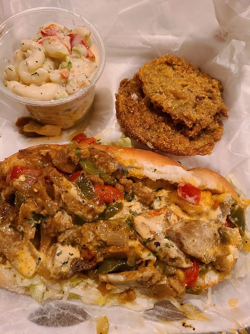 Vegan chicken philly, pasta salad, fried green tomatoes at The Vegan Spot in Kansas City