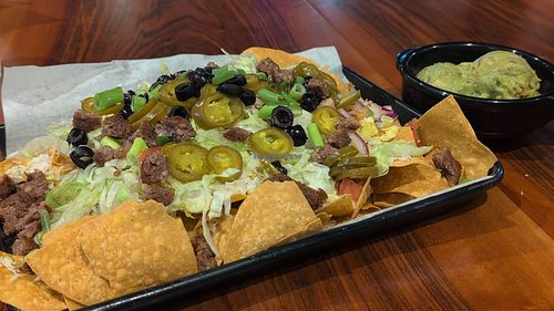 Vegan nachos with guacamole at District Eat & Play in Oviedo
