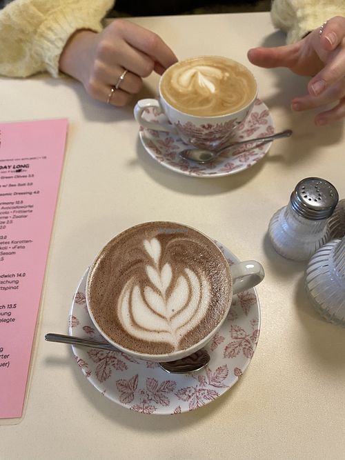 Cappuccino & hot cocoa  at OM NOM NOM CAFÉ in Munich