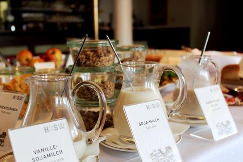selection of milks for breakfast - vanilla soy milk, soy milk and hazelnut milk at Hotel Swiss Die Krone in Kreuzlingen