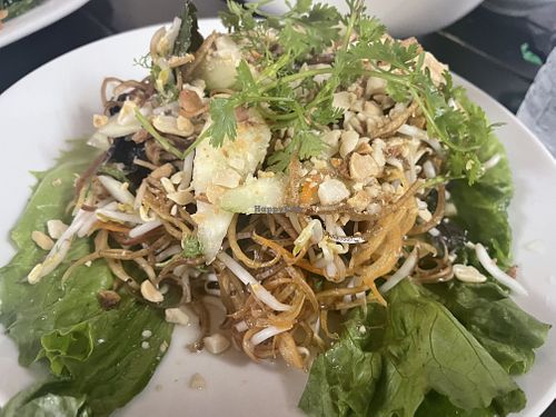 I think this is the fried sweet potato leaves with garlic    at Katze Vegan & Vegetarian  in Hanoi
