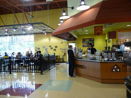 The Common Market's in-store cafe. A variety of eat-ready hot & cold foods are availabe including pizza, paninis, and nummy smoothies. at Common Market Food Co-op in Frederick