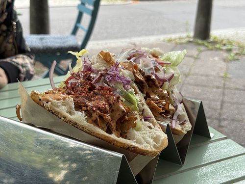 Two delicious fresh fiöners, one spicy, in their rack  at Vamos Veganos in Berlin