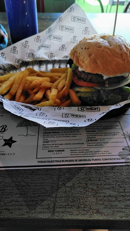 Beyond meat burger with fries. Make sure to ask WITHOUT mayo and WITH vegan cheese. You can tell them to add guacamole instead. at HomeB - Descubrimientos in Chiclana De La Frontera