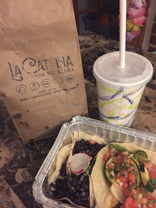 Tacos, chips, and tamarindo drink at La Catrina in Boston