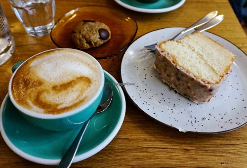 Flat White + Yogurt cake + Pistachio cookie at Amendūla Café in Paris