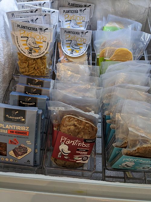 Deli case packaged meats at Planticeria in Panama City