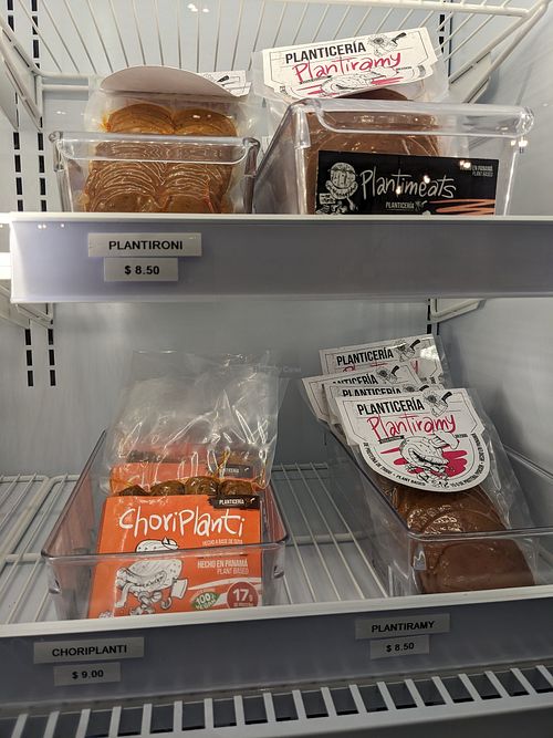 Deli case packaged meats at Planticeria in Panama City