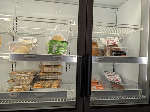 Deli case entrees and meats to go at Planticeria in Panama City