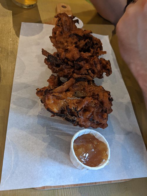 Vegan onion bajis with chutney and mint raita. at Timmy's Bar & Kitchen in Carlisle