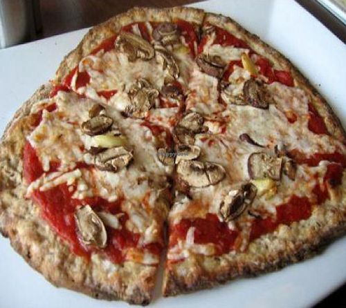 very vegan: crimini mushrooms, roasted garlic, tomato sauce and soy cheese by brittany at Pizza Fusion in Fort Myers