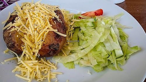 Jacket potato with vegan cheese at Ralphy's in Morecambe
