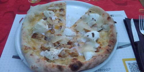 Black truffle pizza with vegan mozzarella. at Giardino in Bellinzona