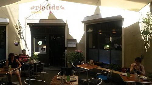 Entrance with some tables at Cafe Riptide in Braunschweig