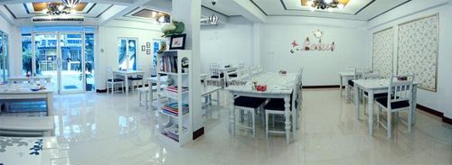 Cozy interior in white color at Dok Bua Vegetarian - Lotus Vegetarian in Phuket