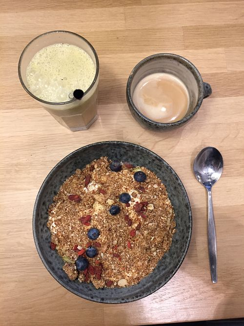 Granola, coffee and juice at 42°Raw in Copenhagen
