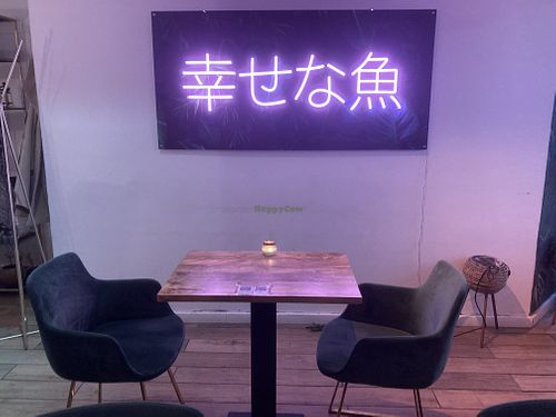 The sign says: happy fish at Vegan Sushi Bar - Downtown in Amsterdam