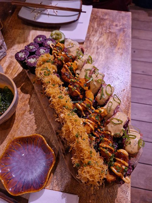 Flambee salmon, shrimp tempura and tuna rolls at Vegan Sushi Bar - Downtown in Amsterdam