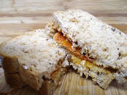 vacon sandwich on brown with just a little sauce ;-) at Daisy's  in Torquay