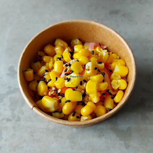 Side salad with pickled carrot, radish & red onion; sweet corn; sesame seeds. at No Bones in Bagarmossen