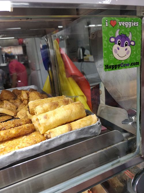 Spring rolls hash brown and HappyCow stickers at Fo SuShi Vegetarian Food 佛素食 in West Singapore