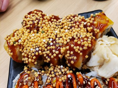 8) SMOKY SAKE ROLL
King Mushroom Tempura, Vegan Smoked Cheese, Avocado, Cucumber, Vegan Salmon Sashimi, Sushi Sauce, Crispy Rice Puff -- yum, yum for the tum at Wellness Sushi in Denver