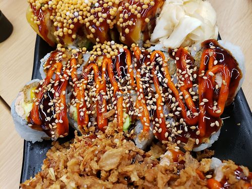 2) KAKIAGE SUPREME ROLL
Kakiage (Japanese Mix-veggie Tempura), Wellness's Krab Salad, Avocado, Cucumber, Spicy Sauce, Sushi Sauce, Sesame Seed --  at Wellness Sushi in Denver