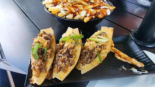 shiitake stuffed tofu. pretty good. not my first choice at wellness. many other yummier dishes at wellness. at Wellness Sushi in Denver