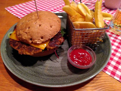 Vegan burger with homemade bean patty and fries at Heuboda in Brand Bei Bludenz