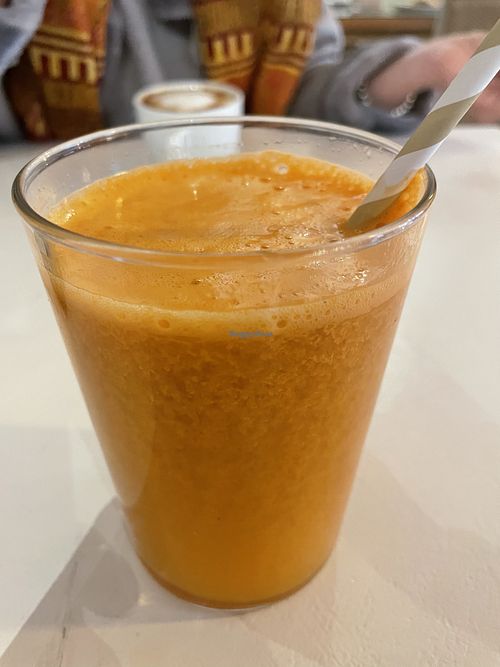 Super juice for breakfast. Carrot ginger and sth else  at Siduri in Mallorca
