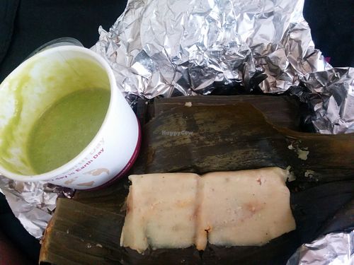 Banana leaf tamales - soy protein in savory mole, capers, potatoes, green olives inside organic corn masa steamed in banana leaf at Flacos in Berkeley
