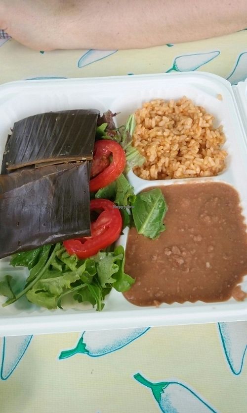 plate with refritto beans, rice, salad and our choice of at Flacos in Berkeley