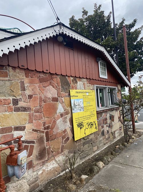 Walking Up to Building w/Signage of Proposed Project  at Flacos in Berkeley